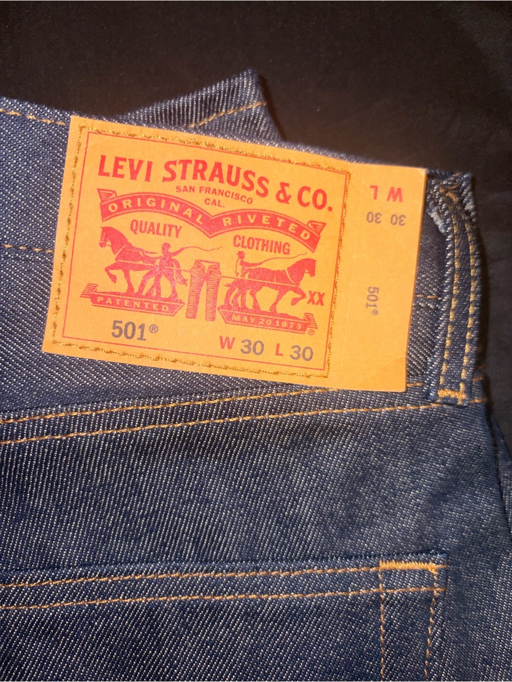 Levi's 501 Men’s Straight Jeans in Dark Blue with Tan Patch
